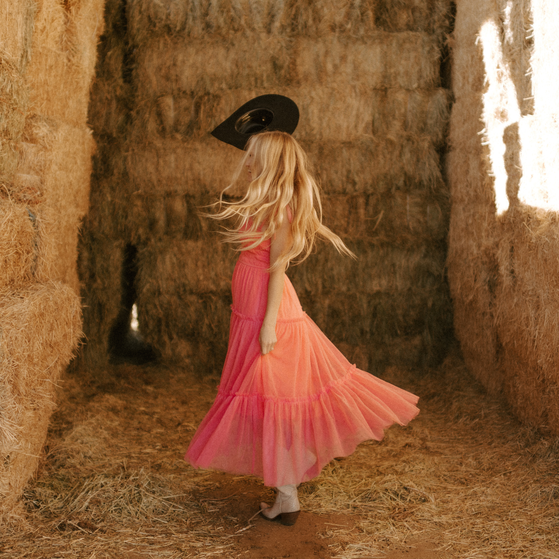 Sarah Elrod in pink tule maternity dress, cowgirl barbie
